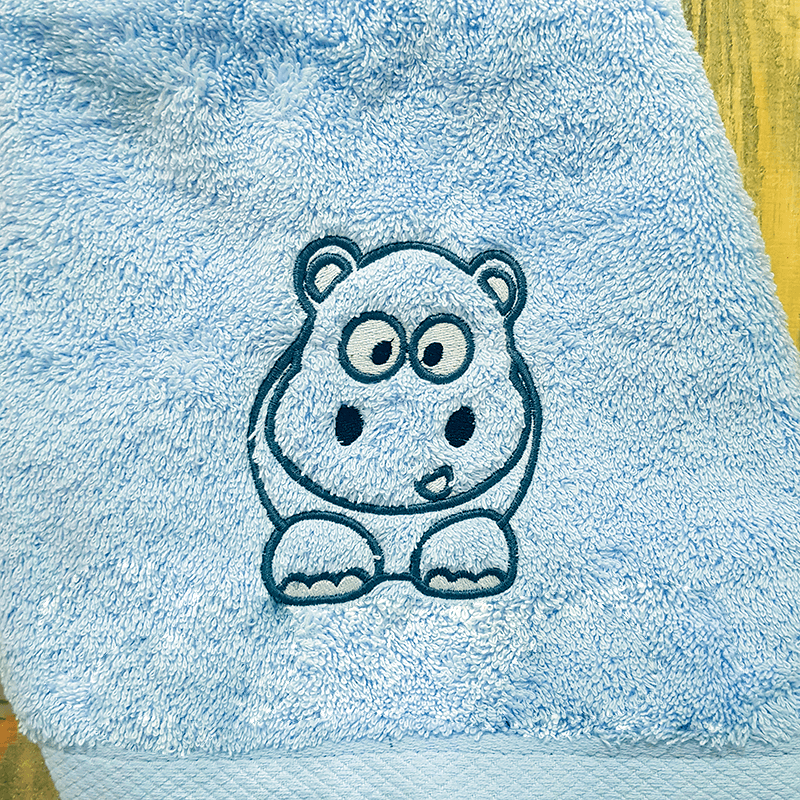 toalla azul hipopotamo