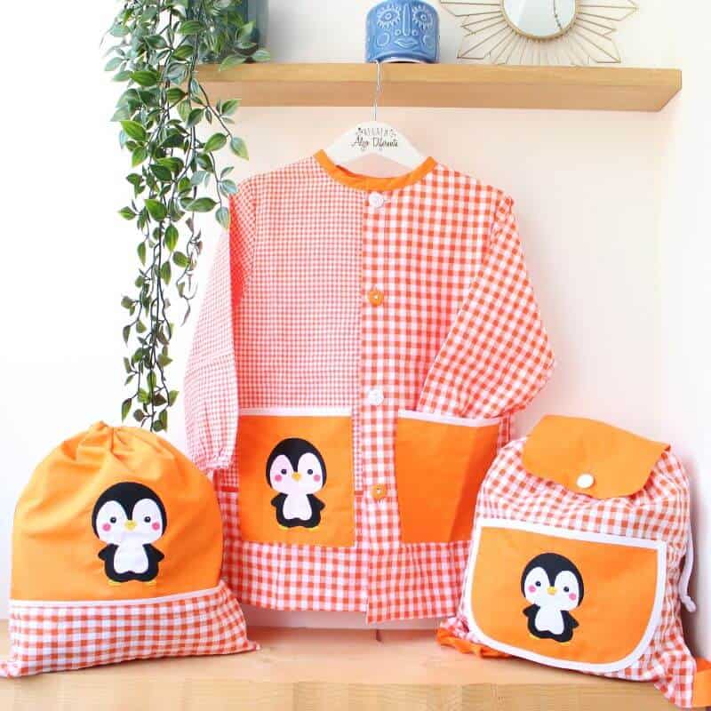 Babi/Bata escolar bordada naranja | Colección Pinguino